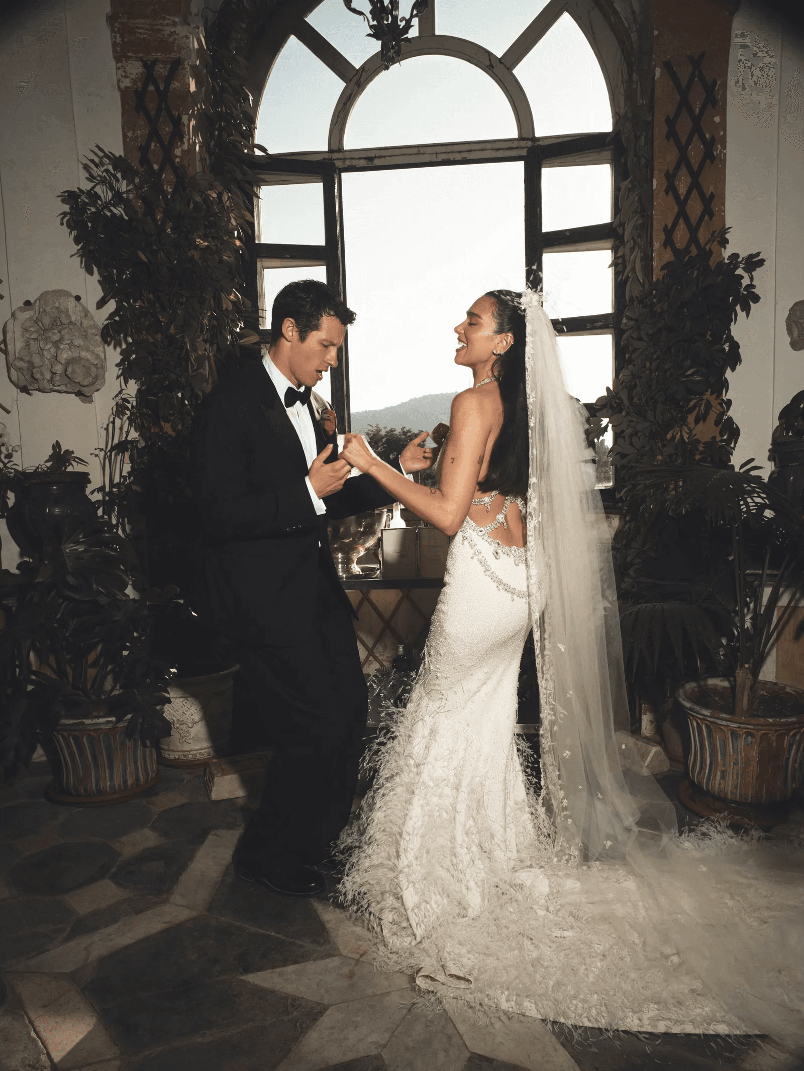 A breakdown of Dua Lipa's wedding looks that broke the internet